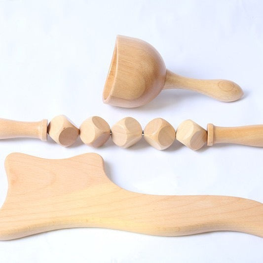 AUREKO contour body board shown with coordinating natural wood massage tools